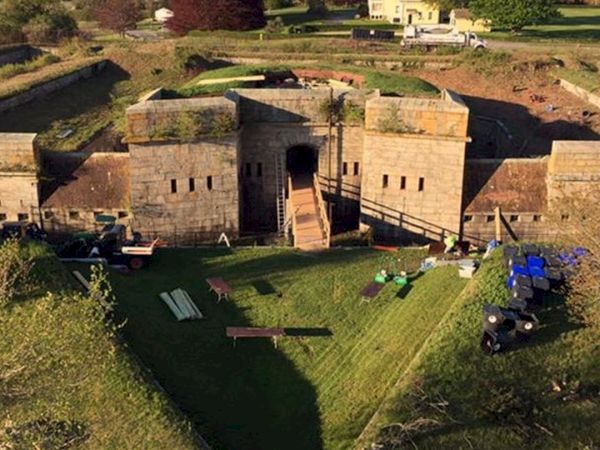 An aerial view of Fort Adams State Park, a well-preserved historic fort with thick stone walls, a central gate.