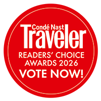 Golden red circular logo reading “Condé Nast Traveler Readers’ Choice Awards 2026 VOTE NOW!”